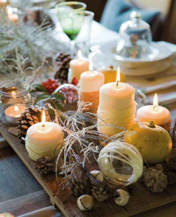 decoracion con velas y piedras navidad